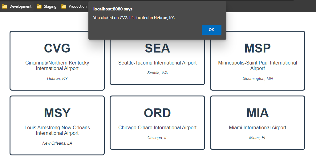 Vue site with alert pop-up that reads "localhost:8080 says You clicked on CVG. It's located in Hebron, KY."